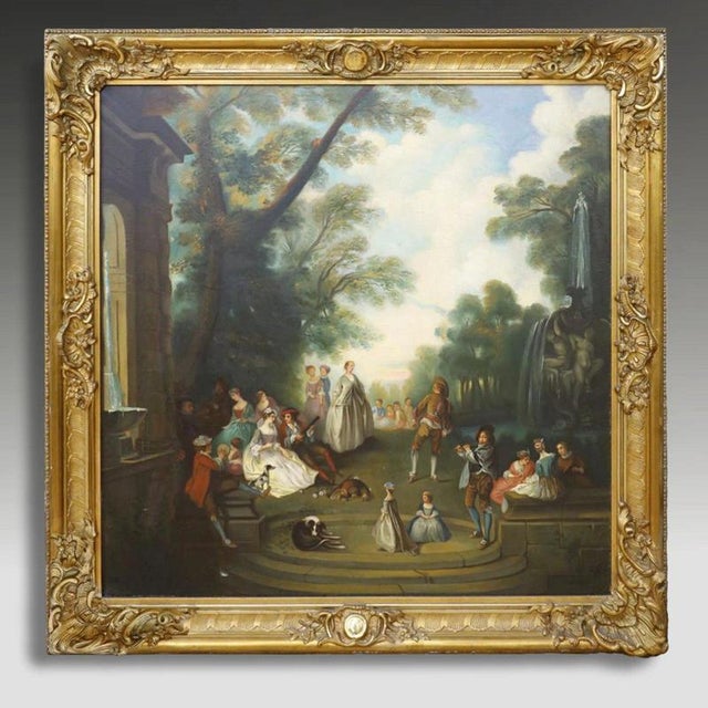 A large and atmospheric late 19th-century oil painting depicting an elegant fête galante scene in the Italianate...