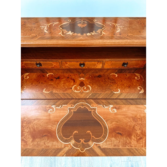 A lovely bombé-shaped secretaire in the louis xv taste, made in italy in the 1960s. This is the kind of piece that...