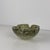 A mid-century Galliano Ferro pulegoso Murano glass bowl, created in Murano, Italy, during the 1960s, in subtly olive-green...