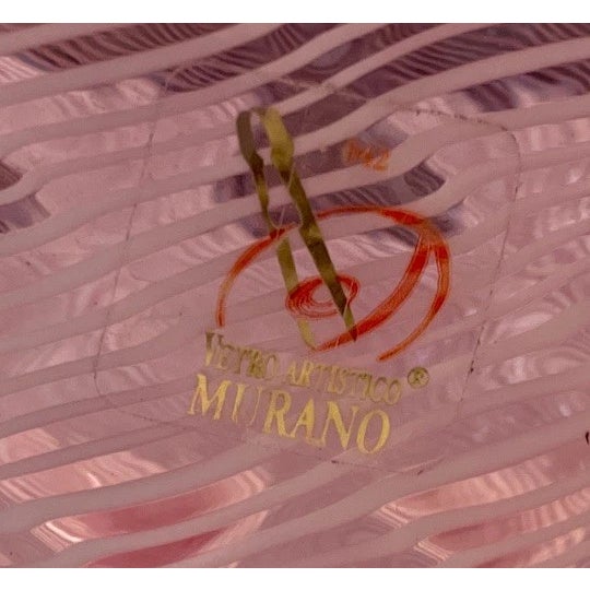 Add a touch of timeless Italian elegance to your space with this exquisite Murano glass handkerchief vase. Handcrafted by...