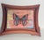 Abstract modern Red Butterfly collage on abstract background in profiled frame.