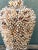Showcasing intricate coastal folk artistry, this vintage mid-century urn-form sculpture is densely encrusted with...