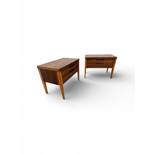 These striking pair of Mid-Century Modern Lane Tuxedo walnut nightstands embody the clean lines and refined craftsmanship...