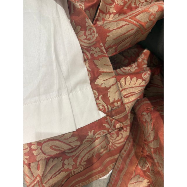 Burnt red and gold, lined, fortuny curtains. Extra long