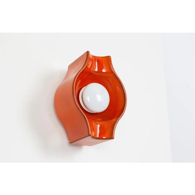 1 of 6 ceramic dark orange wall light sputnik designed by cari zalloni germany, 1970s heavy quality and in very good...
