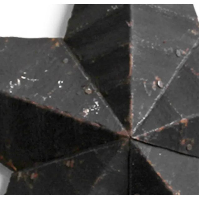 Vintage black barn star made from recycled galvanized metal roofing with a rustic aged painted patina. Industrial...