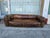 Distressed Leather Sofa with a Worn Brown Finish, this has a low-profile silhouette and deep seating. The Leather With...