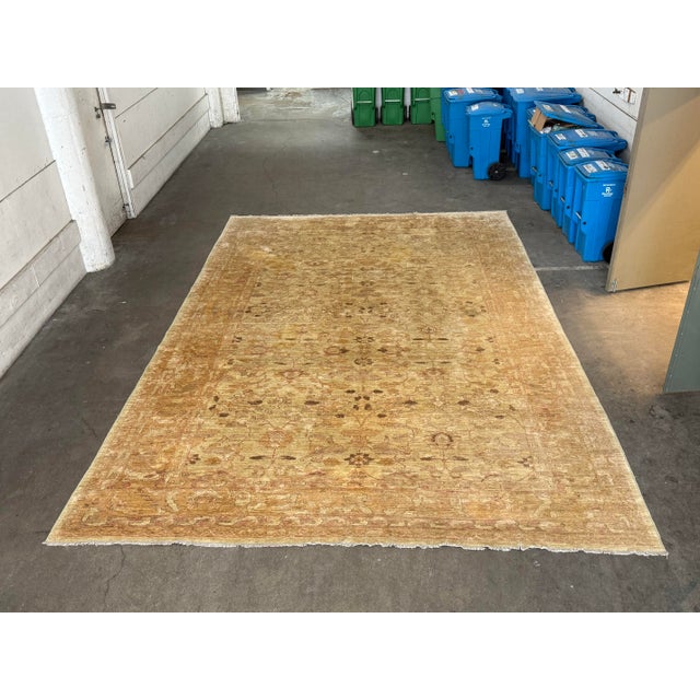 Design Plus Gallery presents a 11ft 6in × 17ft 7in Egyptian Khyber Rug. This oversized wool rug showcases a softly aged...