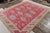Tribal Antique Indian Agra Rug in an All Over Red, Blue, Yellow Medallion Pattern For Sale - Image 3 of 8