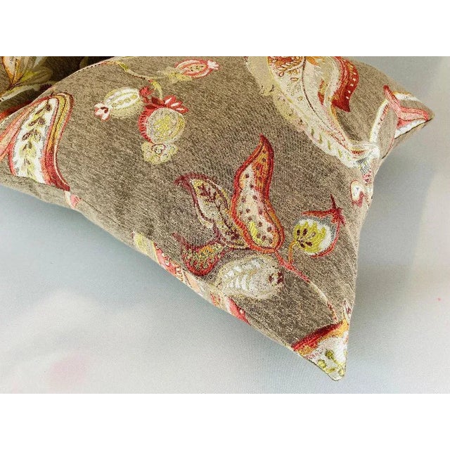 Contemporary set of 2 costume made pillows with high quality of fabric and down insert , no zipper closing lightly used...