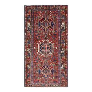 Antique Colorful Persian Heriz Rug With a Bold Geometric Design