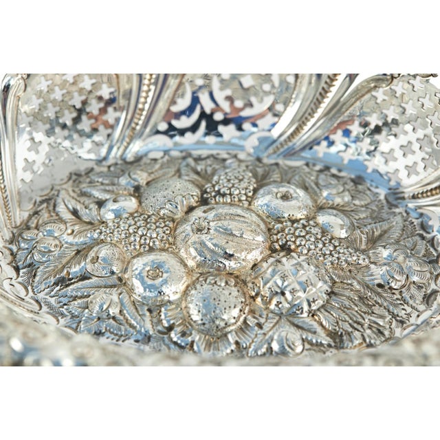 Late 19th Century Victorian antique silver bon bon dish, highly decorative with pierced work decorated with fruit and...