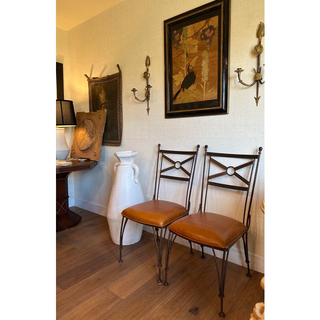 Fabulous pair of Neoclassical candle sconces with Versace-style Medusa and lion heads. Cast iron in the manner of Gio...