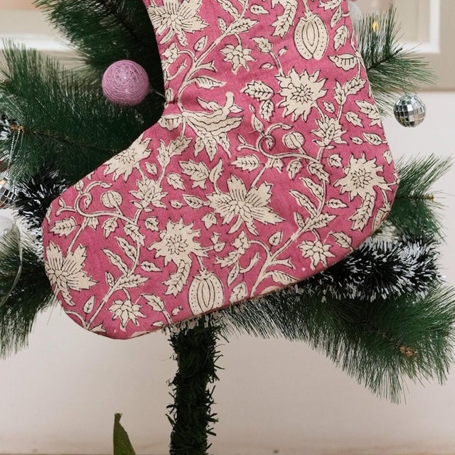 Add festive charm to your home with this handmade block print stocking, crafted from a premium linen-blend fabric and...