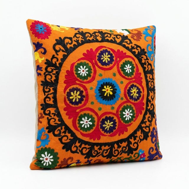 This beautiful 27'' x 30'' hand-embroidered Suzani pillow cover was made from authentic Uzbek cotton fabric. The intricate...