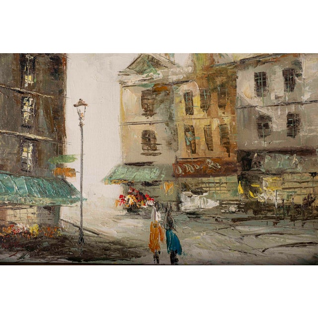 A richly textured vintage original oil painting depicting an atmospheric European street scene, presented in an elaborate...