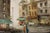 A richly textured vintage original oil painting depicting an atmospheric European street scene, presented in an elaborate...
