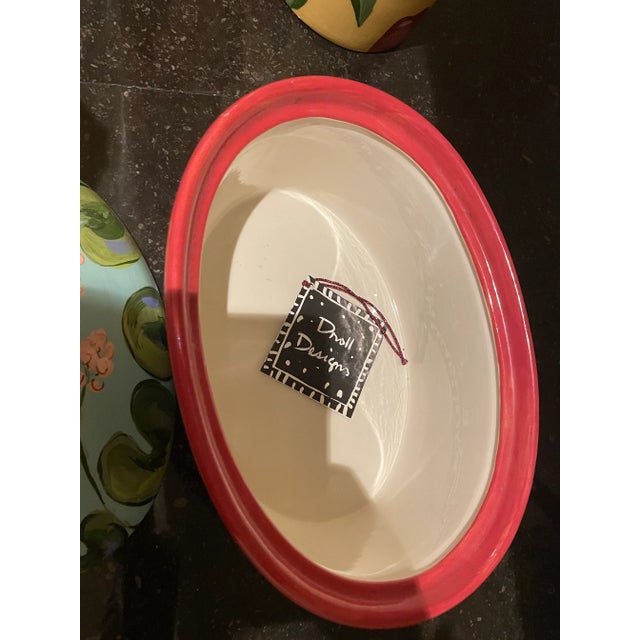 hand painted ceramic casserole pot that is also very decorative to place out or serve