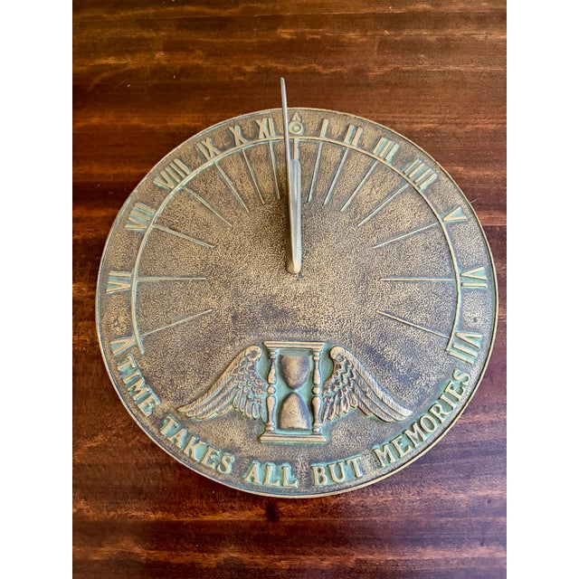 A stunning vintage iron verdigris garden sundial reading "Time Takes All But Memories" USA, Late 20th Century Measures:...