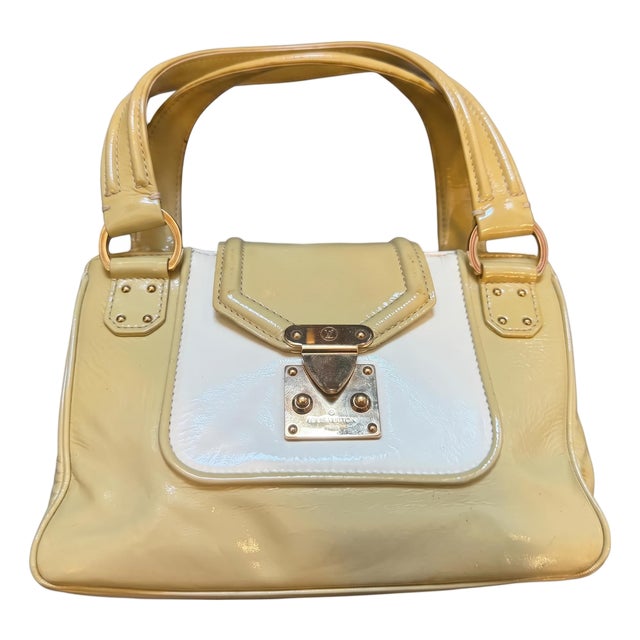 A Vintage Louis Vuitton Beige and White Leather Cruise Hand-Bag For Sale