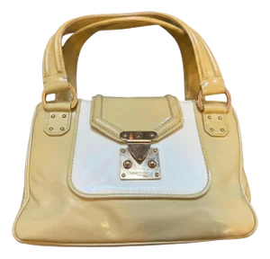 A Vintage Louis Vuitton Beige and White Leather Cruise Hand-Bag