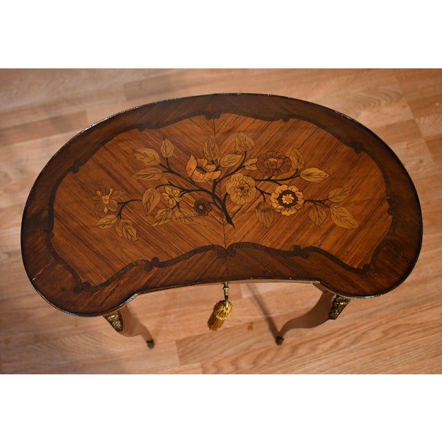We are pleased to offer this beautiful Antique French Louis XV side table, from the 1900s. Marked Bedel & Cie France on...