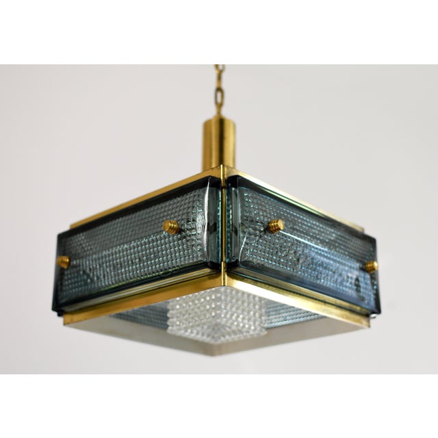 Stunning pendant light made by Malmö Metallvarufabrik Sweden. Made from brass and pressed glass. In great condition,...