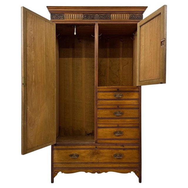 An impressive and beautifully crafted 19th-century Victorian compactum wardrobe, constructed in richly figured ash and...