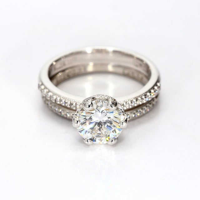 Stone Information - --------------------------------------------- Primary Stone(s): Diamond GIA?: 2235881945 Eye Clean -...