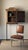 Scraped back to its original wood, this striking cabinet makes a bold statement in any setting. The antique body is...