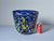 This Murano glass cachepot is crafted using the traditional Millefiori technique. The intense blue of the glass highlights...