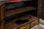 Painted Tibetan cabinet with hidden storage in base.