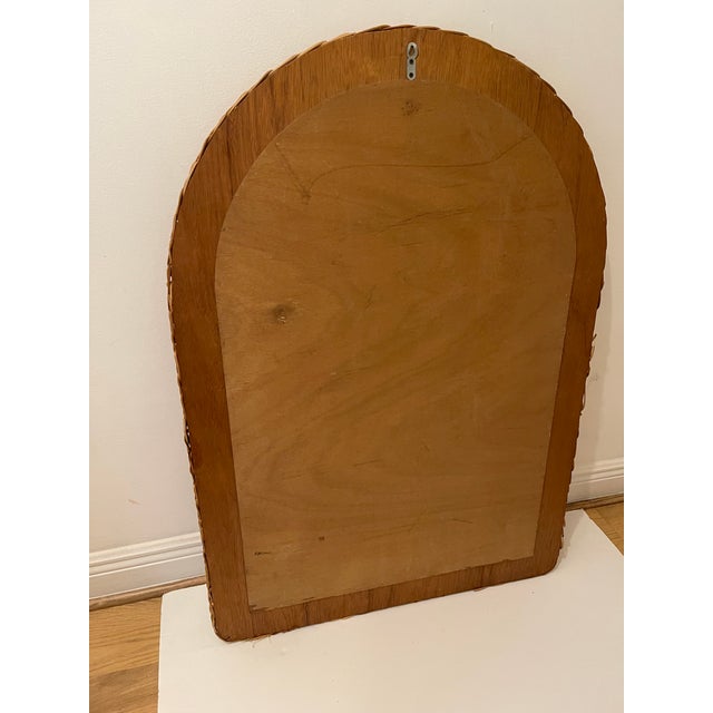 Large mid century handmade woven rattan mirror.