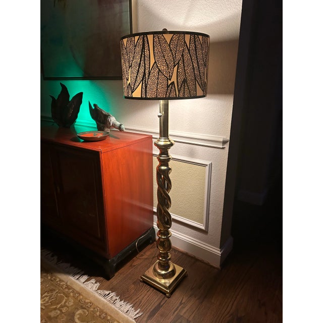 Timeless transitional style. Very heavy solid brass floor lamp. Shade is new but also comes with original brass shade...