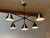 Design Plus Gallery presents a Modern Cone Chandelier from Elyccupa. The chandelier is designed in industrial vibes with...