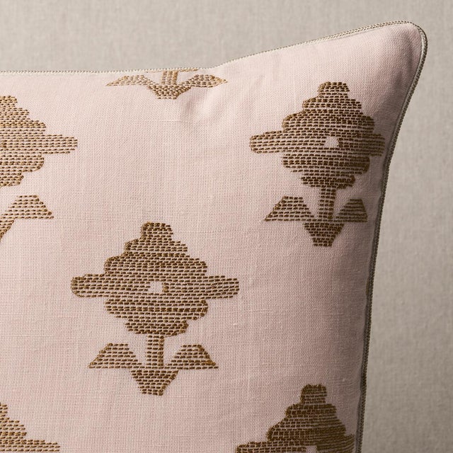 This pillow features Rubia Embroidery. Made on a 100% linen ground, the stylized flowers are rendered in an irregular...