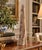 A beautifully proportioned marble obelisk in richly veined shades of green and brown. The sculptural silhouette and...