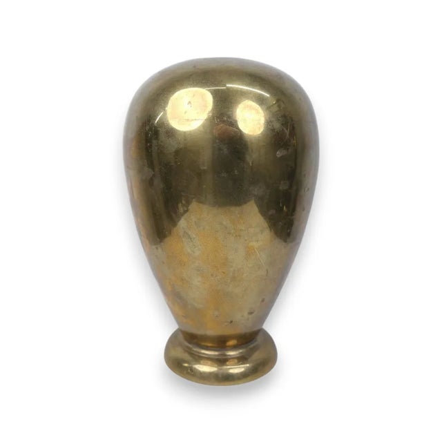 Classic, elegant, gold-colored brass vase.