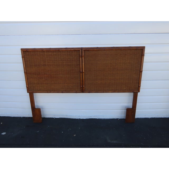 This Headboard is made of wood, solid wood, bamboo, wicker, and caning. It was made by American of Martinsville, it is not...