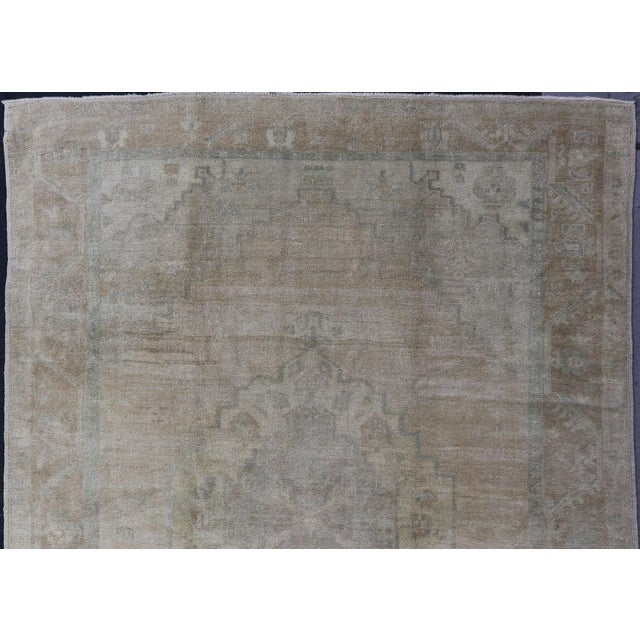 Light color Oushak Vintage Rug With Pastel Colors in Tan, Green, Butter Yellow and Taupe Light color Vintage Oushak Rug...