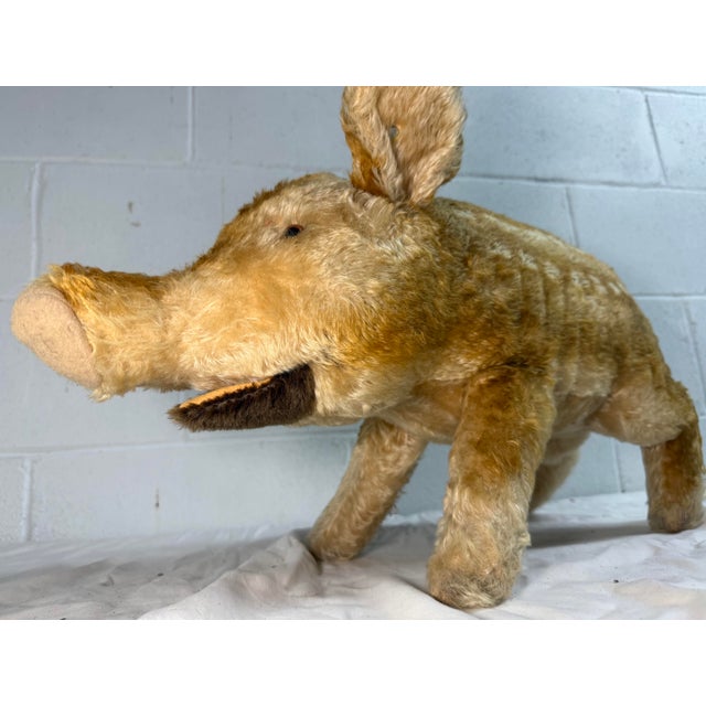 Up for sale is a large 23-inch long vintage handmade German Steiff boar stuffed animal named Dalle. This large stuffed...
