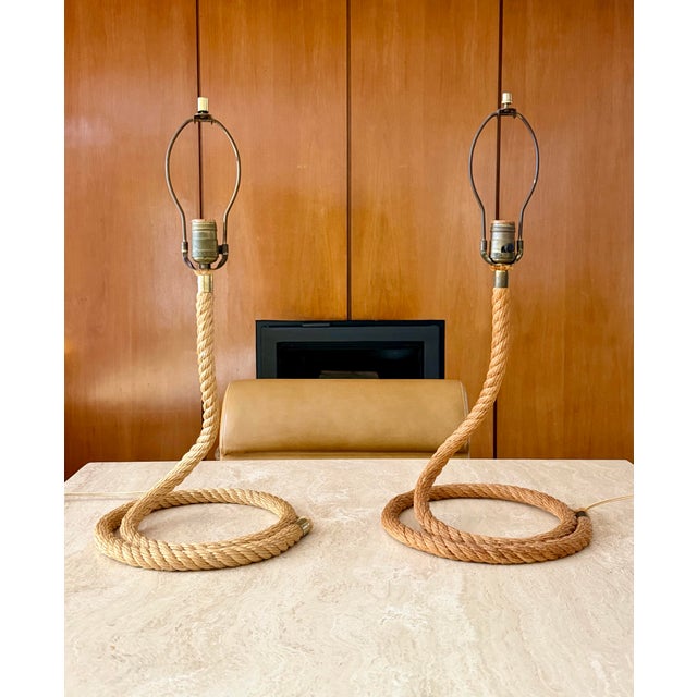 We are very pleased to offer this beautiful pair of sculptural rope table lamps, circa 1970s, in the style of French...