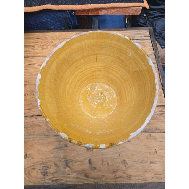 French Confit Bowl 9-1/2"H x 16-1/2"D A beautifully aged French terracotta confit bowl dating to the late 19th century....