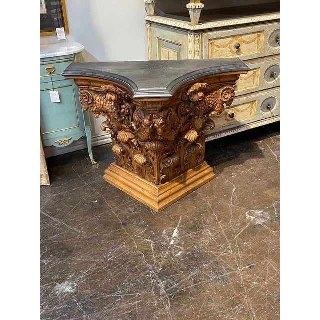 Handsome 19th century Austrian carved pine neo-classical console with slate top. Exceptional intricate carvings on this...