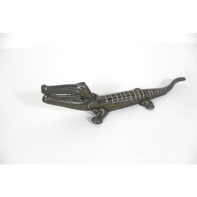 Vintage brass crocodile or alligator nut cracker. This has lots of patina as shown in the photos. Nestor Made in England...