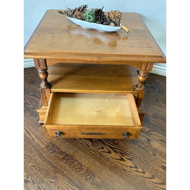Crafted by Cal Shops, this handsome vintage solid maple coffee table showcases timeless American craftsmanship with clean...