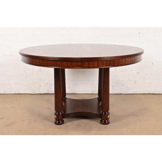 A gorgeous Biedermeier, Neoclassical, Empire, or Regency style split pedestal extension dining table By Henkel Harris USA,...