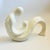 A large vintage postmodern ceramic sculpture of a mother and child. Lovely simplified form, finished in a glossy white...