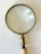 Beautiful and functional brass magnifying glass with a Palm Beach style mother of pearl inlay handle, suitable for viewing...