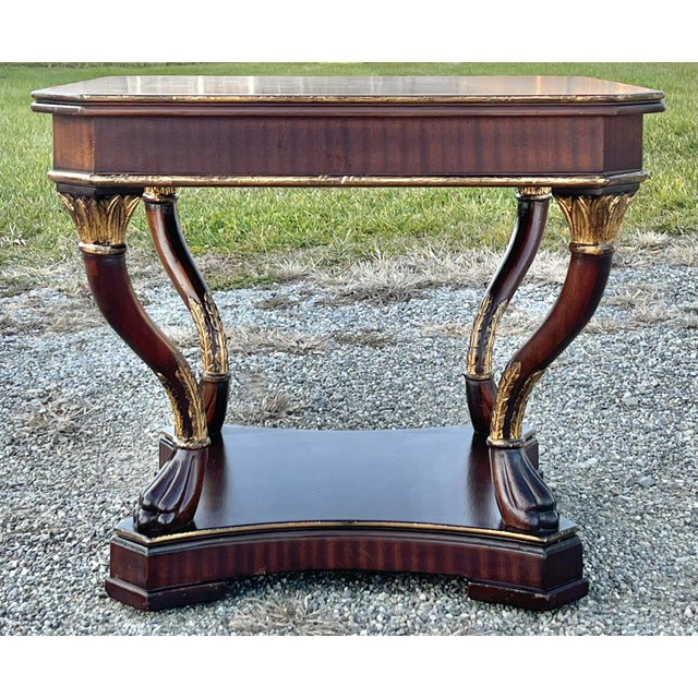 Hollywood regency style carved mahogany cocktail table. The Astell table by Century Furniture. Small in scale, but with...